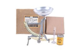 A Johnson Chemical Balance No.18 and Kodak Developer D-76.