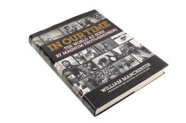 A signed copy of 'In Our Time: The World As Seen By Magnum Photographers'.