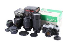 A Fujica STX-1 35mm SLR camera outfit. Chrome. Serial number 4542555.