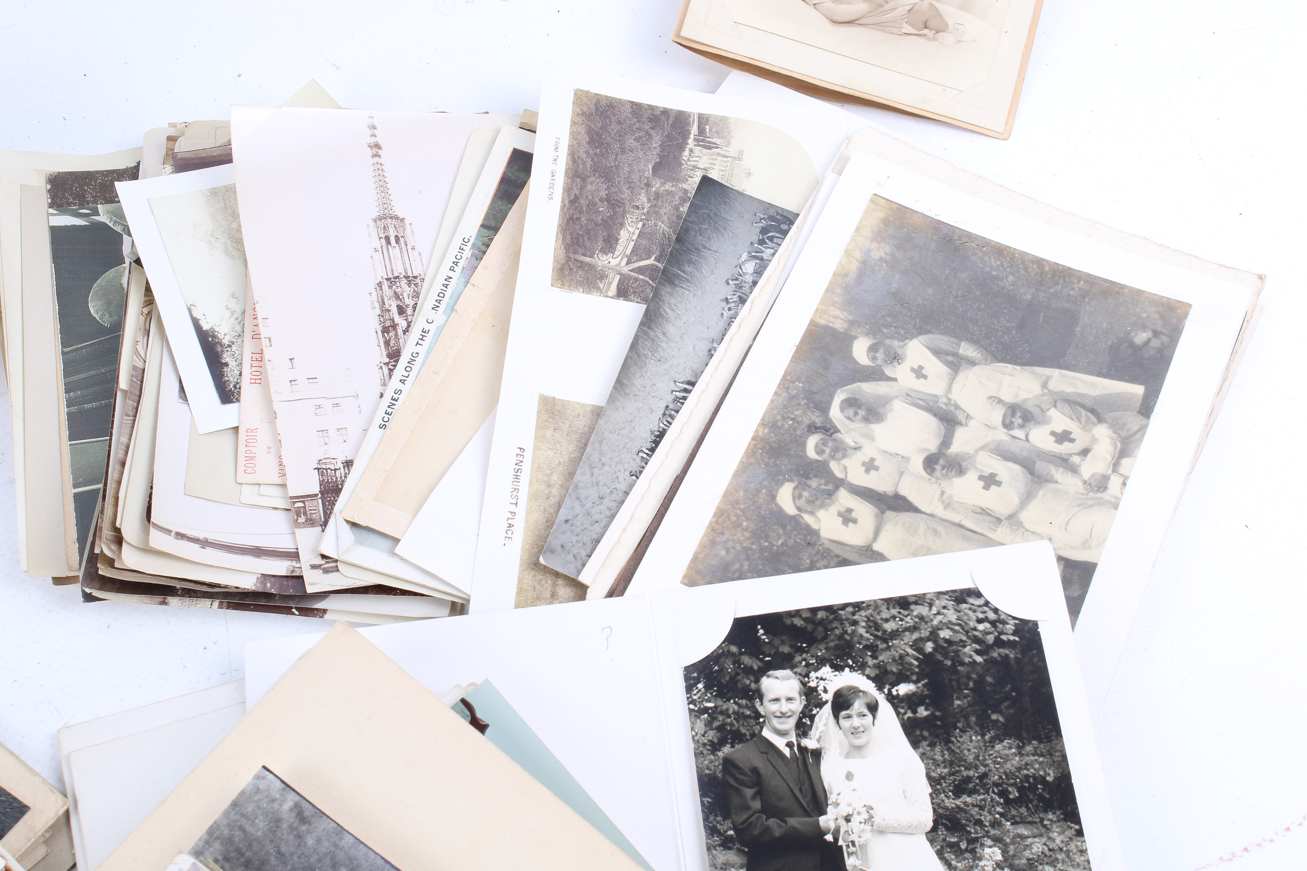 A box of antique and vintage photographs and postcards. - Image 3 of 4