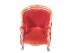 Small walnut carved child's armchair.