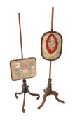 Two pole screens with embroidered panels raised on tripod bases. Largest H146cm.