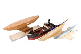 A collection of four assorted model boats. Including three pond yachts, etc. Max.
