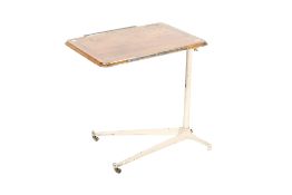 A vintage adjustable over-bed table.