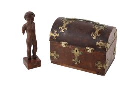 Victorian brass bound dome top casket and a small carved wooden figure of a boy. Max.