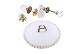 A vintage French white glass lamp shade and five glass door knobs.