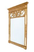 A 19th century Continental style gilt framed wall mirror. Architectural and pierced decoration.