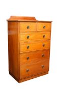 An Edwardian mahogany and string inlaid chest of drawers.