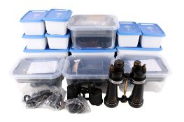 A quantity of assorted binocular spare parts.