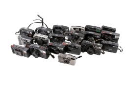 A collection of assorted vintage compact 35mm film cameras.