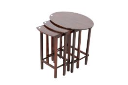 Nest of three mahogany tables. The largest having an oval top. Max.