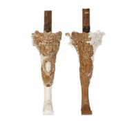 A pair of ornate carved wooden cabriole supports. Decorated with swags and leaves.