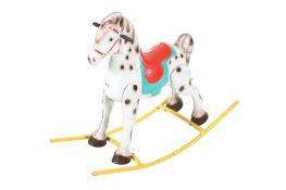 A vintage Mobo painted metal rocking horse.