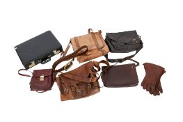 A collection of assorted vintage leather goods. Including bags and a briefcase, etc.