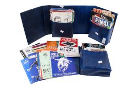 A collection of vintage football programmes.