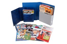 A collection of football club programmes and a collection of vintage football magazines.