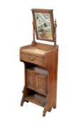 A Edwardian gentleman's oak wash shaving stand with mirror. Having a drawer and cupboard beneath.
