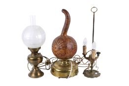 Three assorted brass table lamps. Two converted from oil lamps, etc. Max.