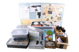 A collection of assorted binocular spare parts and accessories. Including related literature, etc.
