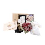 A collection of assorted vintage clothes and textiles.
