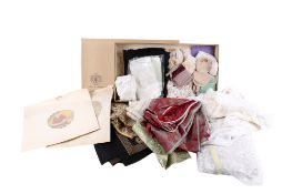 A collection of assorted vintage clothes and textiles.