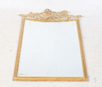 A 20th century antique style gilt framed wall mirror (af).