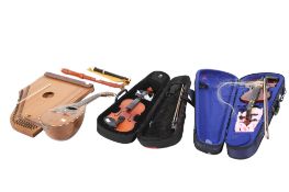 A collection of assorted musical instruments.