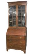 A Georgian mahogany bureau two-piece bookcase.