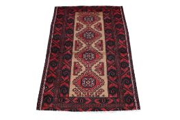 A small beige and black ground rug.