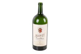 A 1998 Buzet Tradition 5L wine bottle, empty.