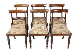 Set of six Victorian carved rosewood dining chairs.