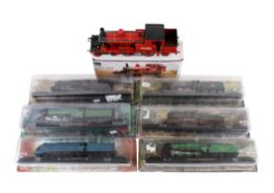A set of six static railway locomotive models and another
