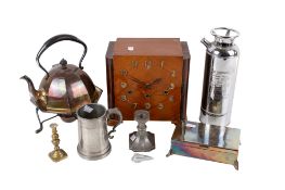 Silver plated kettle on stand also with cigarette box, V&A candlestick and art Deco clock.