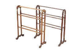 Two early 20th century turned wooden bathroom towel rails. Freestanding with five rails.