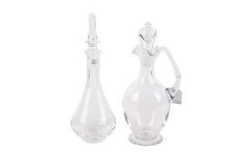 A Stuart glass decanter and a claret jug both with stoppers. Max.