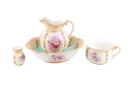 A Victorian four-piece ceramic washbowl and water jug set. Including chamber pot and a vase, etc.