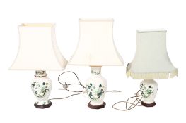 A group of three Mason's Chartreuse ceramic table lamps. All raised on wooden bases. Max.