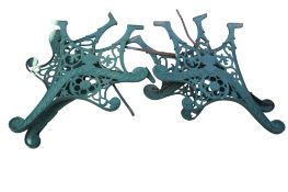Two pairs of cast metal bench ends. Painted green. Max.
