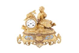 A French gilt metal mantel clock.