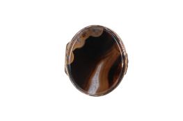 A 19th century oval agate stone pill box with a gilt metal frame.