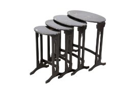 Nest of four japanned oval tables. Each with a different oriental design to the top. Max.