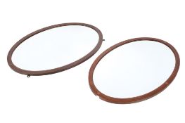 Pair of Edwardian mahogany inlaid oval wall mirrors.
