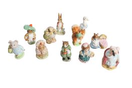 A collection of eleven assorted Beswick Beatrix Potter character figures. Including Mr.