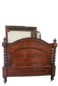 A Victorian mahogany single bed frame with canopy.