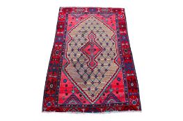 A small handmade runner rug.