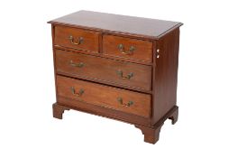 A late Victorian early Edwardian mahogany chest of drawers.