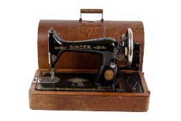 Victorian hand crank Singer sewing machine, cased. No. Y702483.