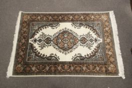 A contemporary Kashmir Indian silk rug.