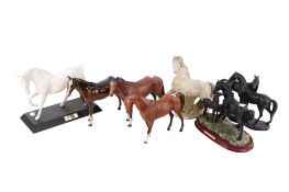 A collection of assorted ceramic horse figures. Including Royal Doulton and Beswick, etc. Max.