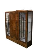 A Deco 1930s period figured walnut display cabinet.